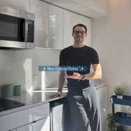 person posing in kitchen