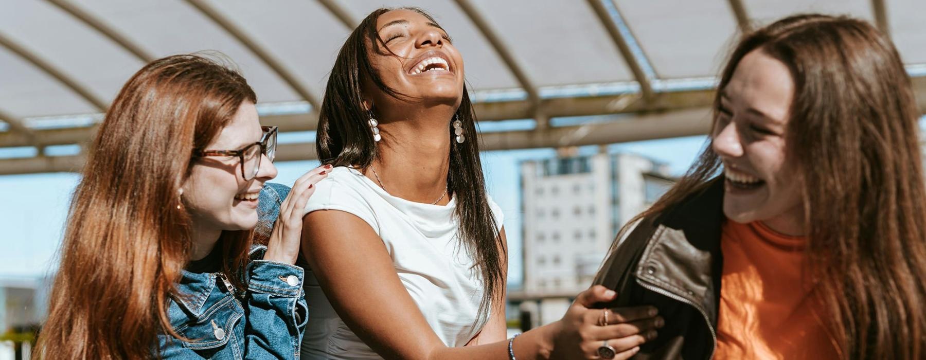 A group of women laughing.